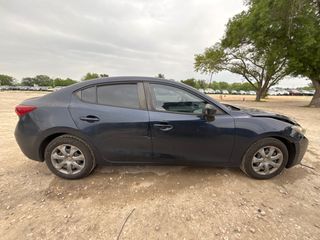 2014 Mazda Mazda3 i Sport - Exterior Side Passenger